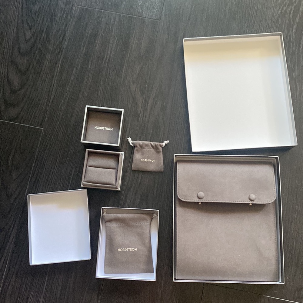Jewelry storage boxes and pouches